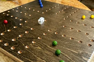 Family enjoying the Wahoo board game, a multi-generational strategy and luck game